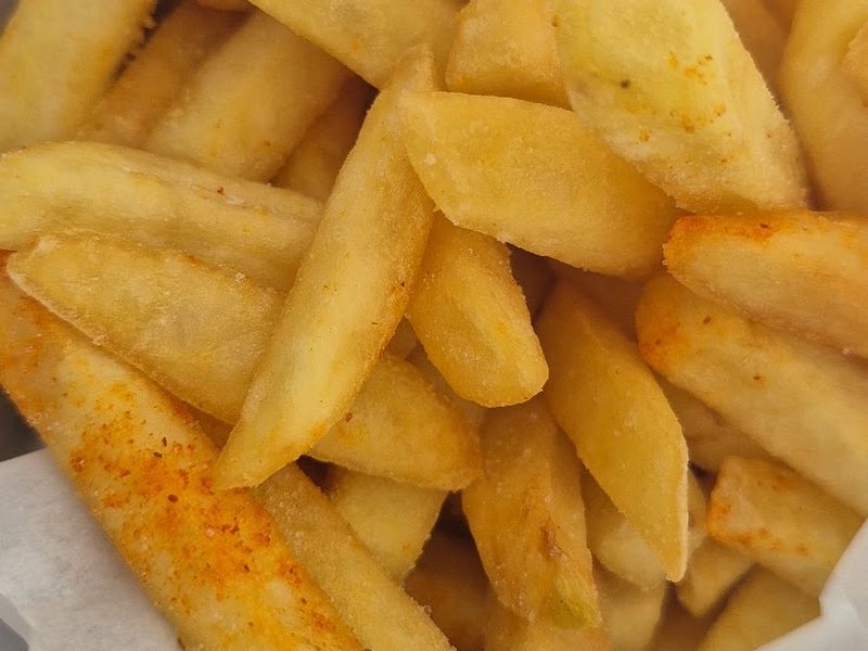 Chips, sauce and coleslaw sides