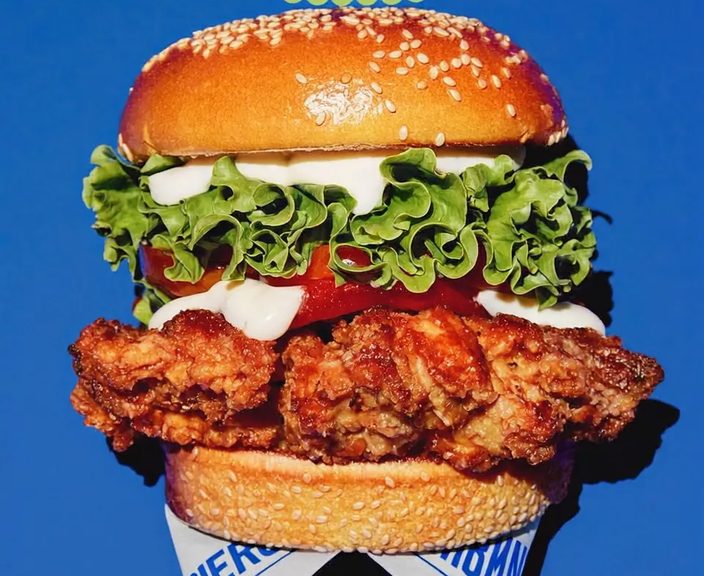 A fried chicken burger in a soft bun
