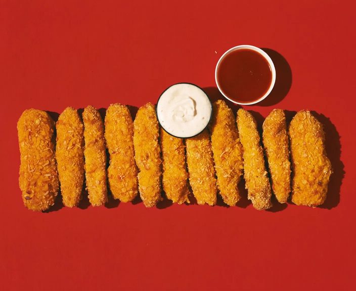 Breaded chicken strips with a dip