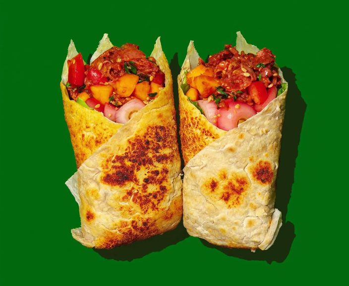 A chicken wrap cut in half
